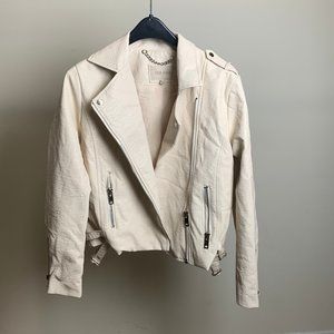 cream long sleeve,leather jacket